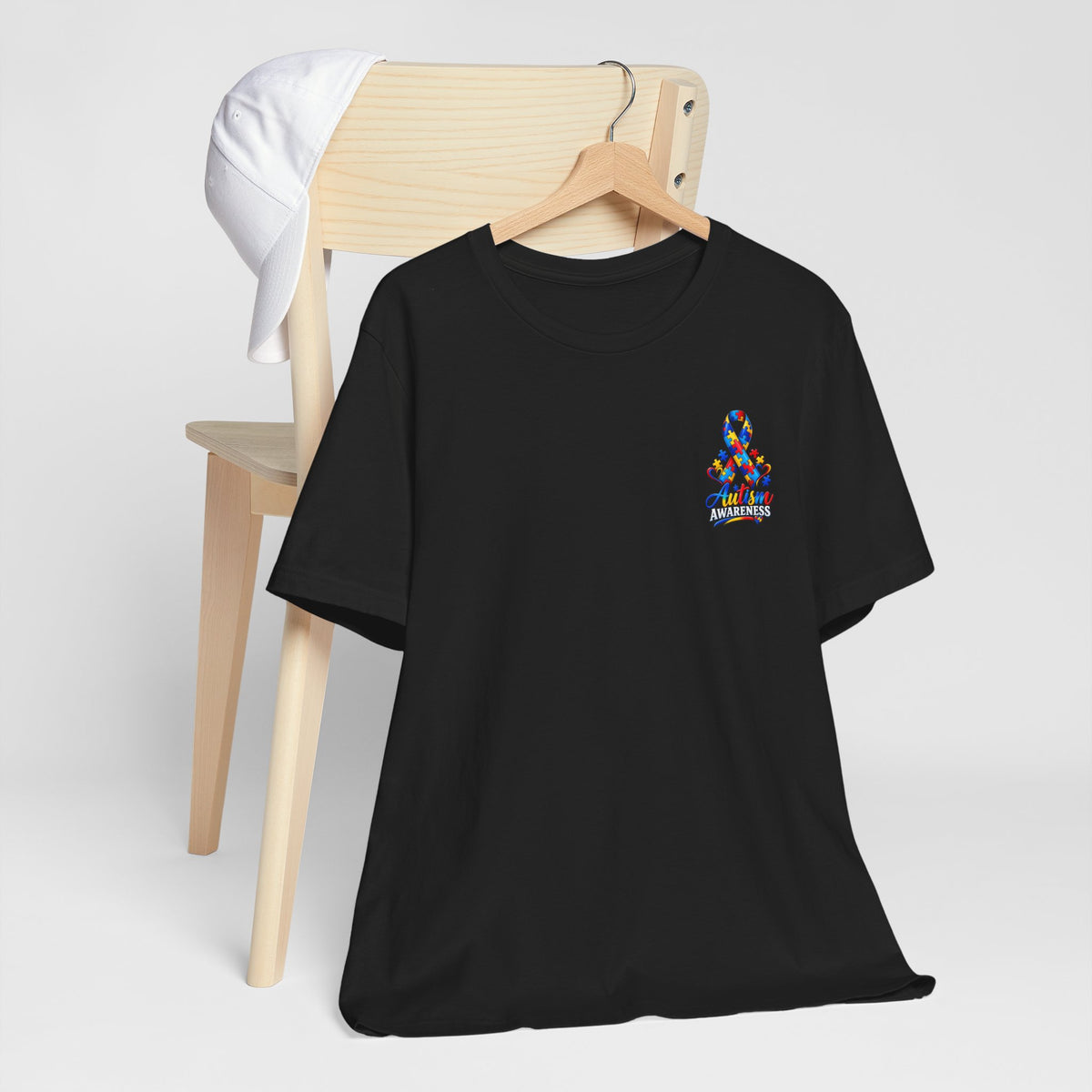 Autism Awareness Ribbon Chest Tee — 'Different, Not Less' Short Sleeve T-Shirt