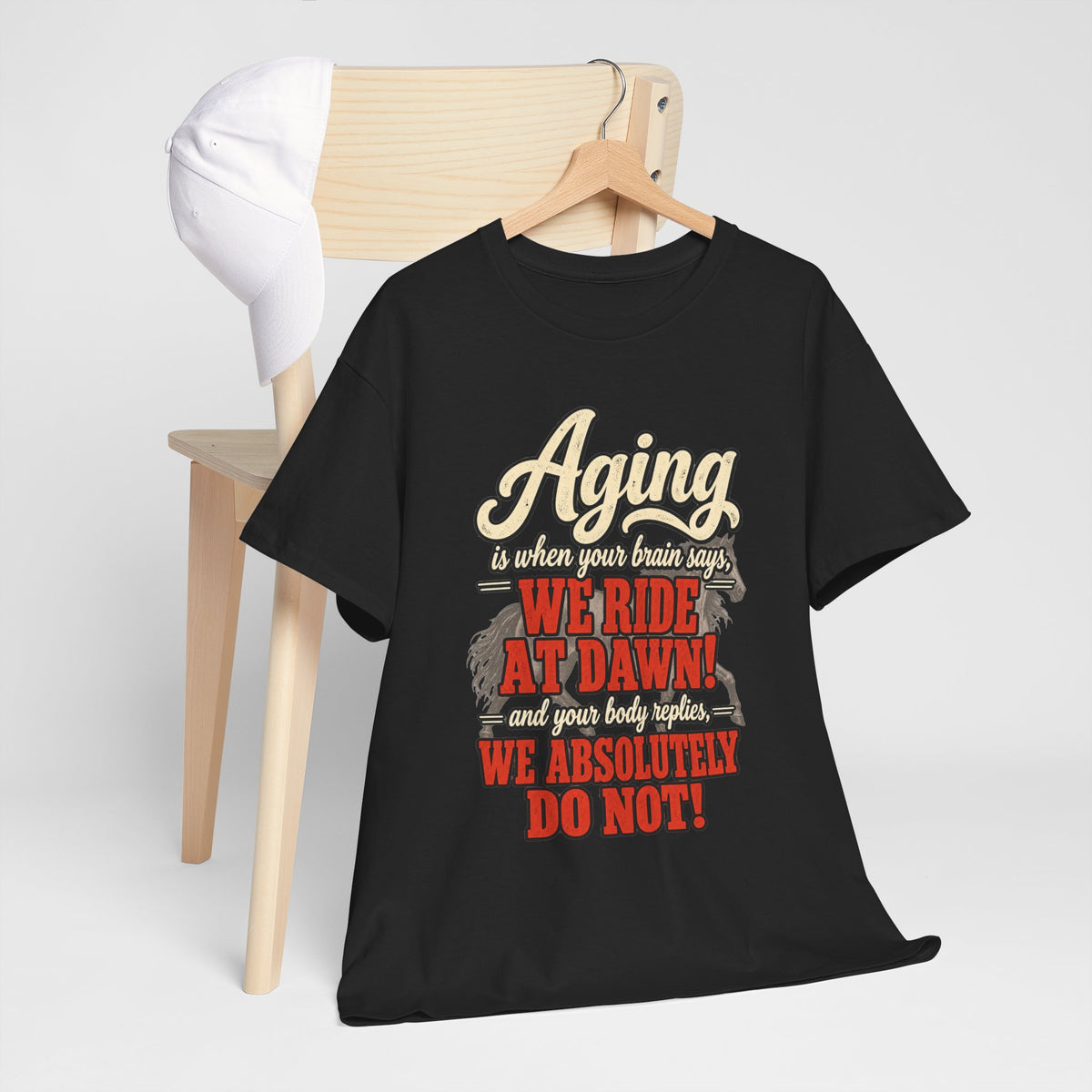 Aging: When Your Brain Says “We Ride at Dawn” Funny Graphic Tee
