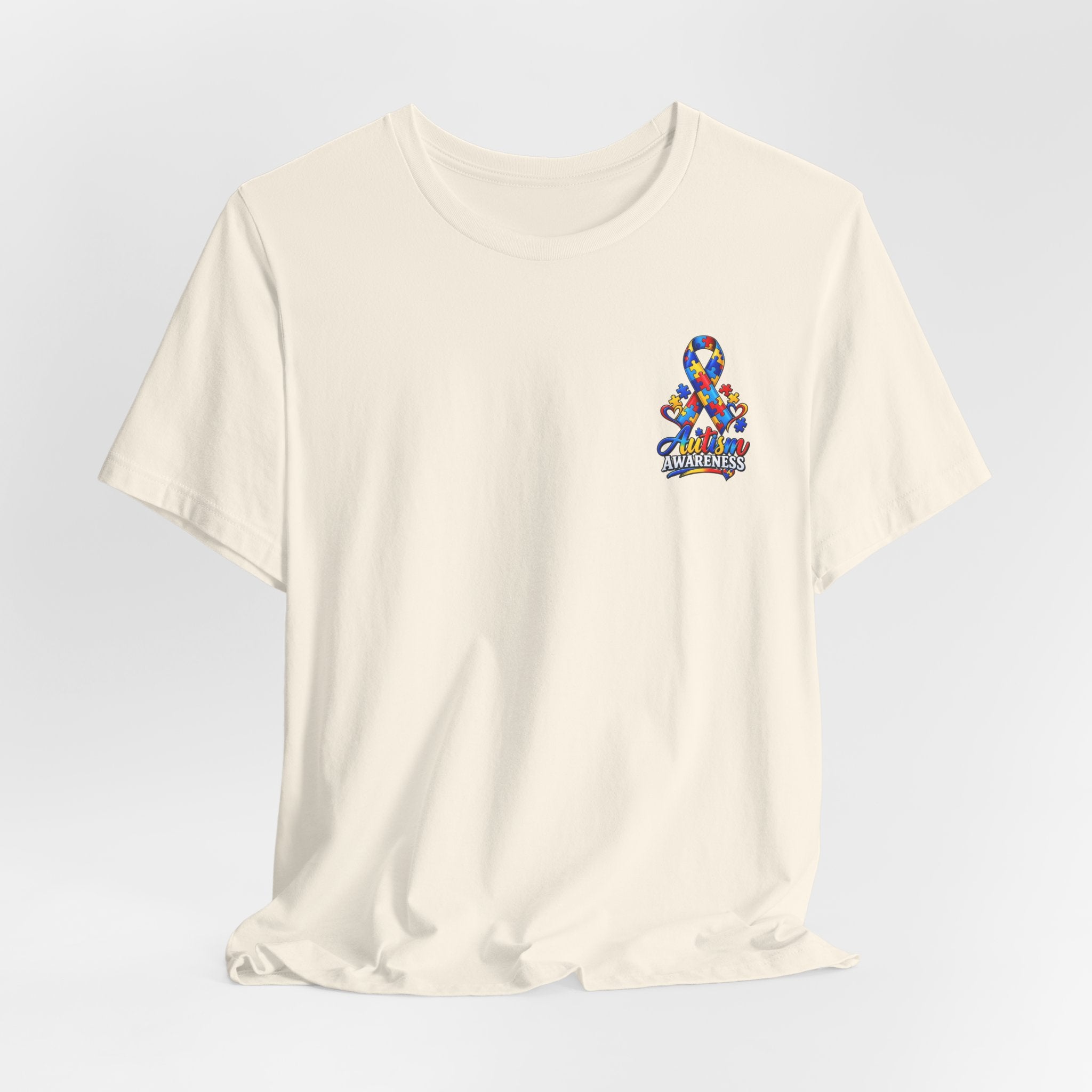 Autism Awareness Ribbon Chest Tee — 'Different, Not Less' Short Sleeve T-Shirt