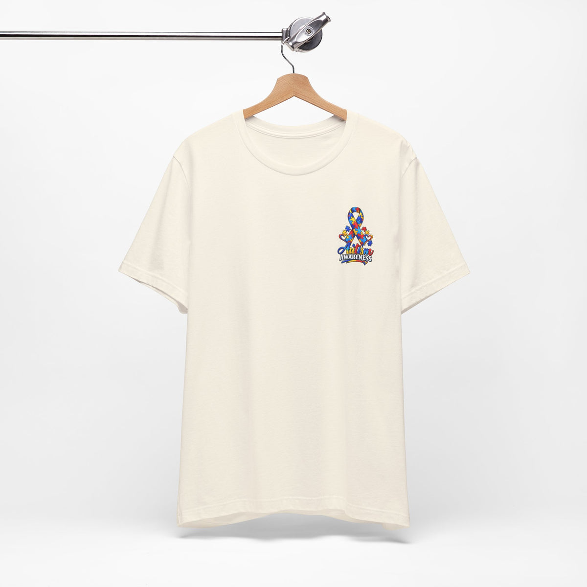 Autism Awareness Ribbon Chest Tee — 'Different, Not Less' Short Sleeve T-Shirt
